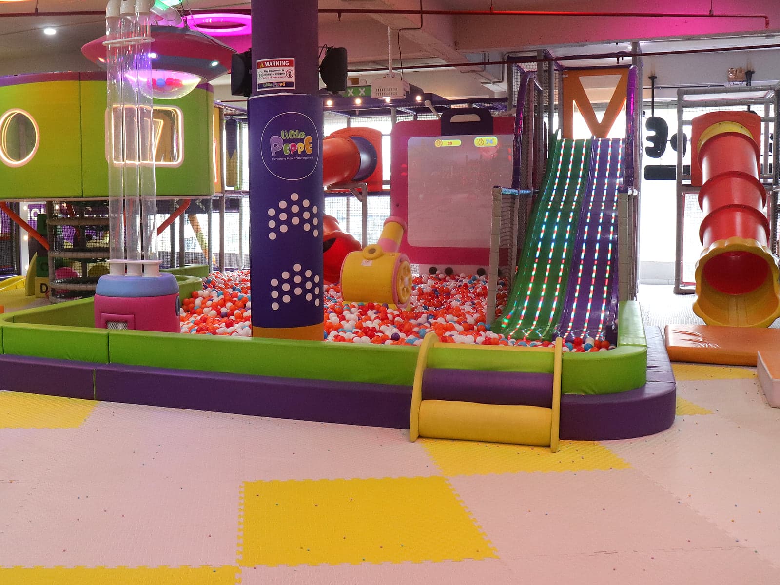 LED Rainbow Wave Slide — Little Peppe indoor kids play zone and party venue in Aluva, Kochi