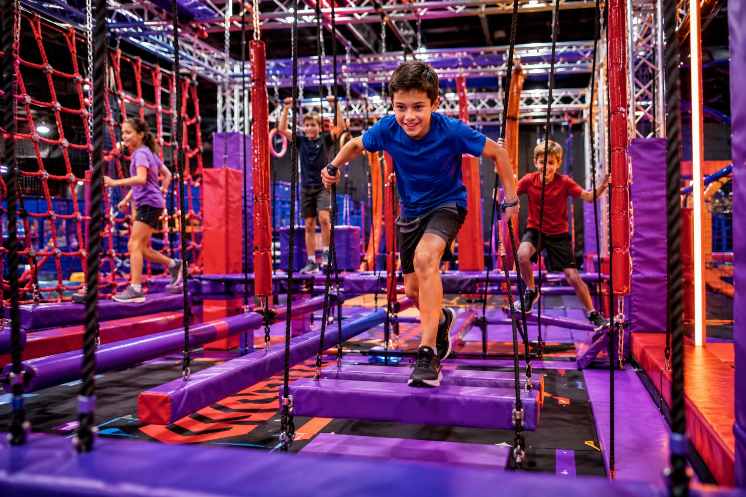 Children conquering ninja circuit obstacles